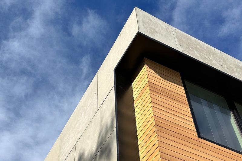 Expansion Art — fiber-cement and cedar corner detail