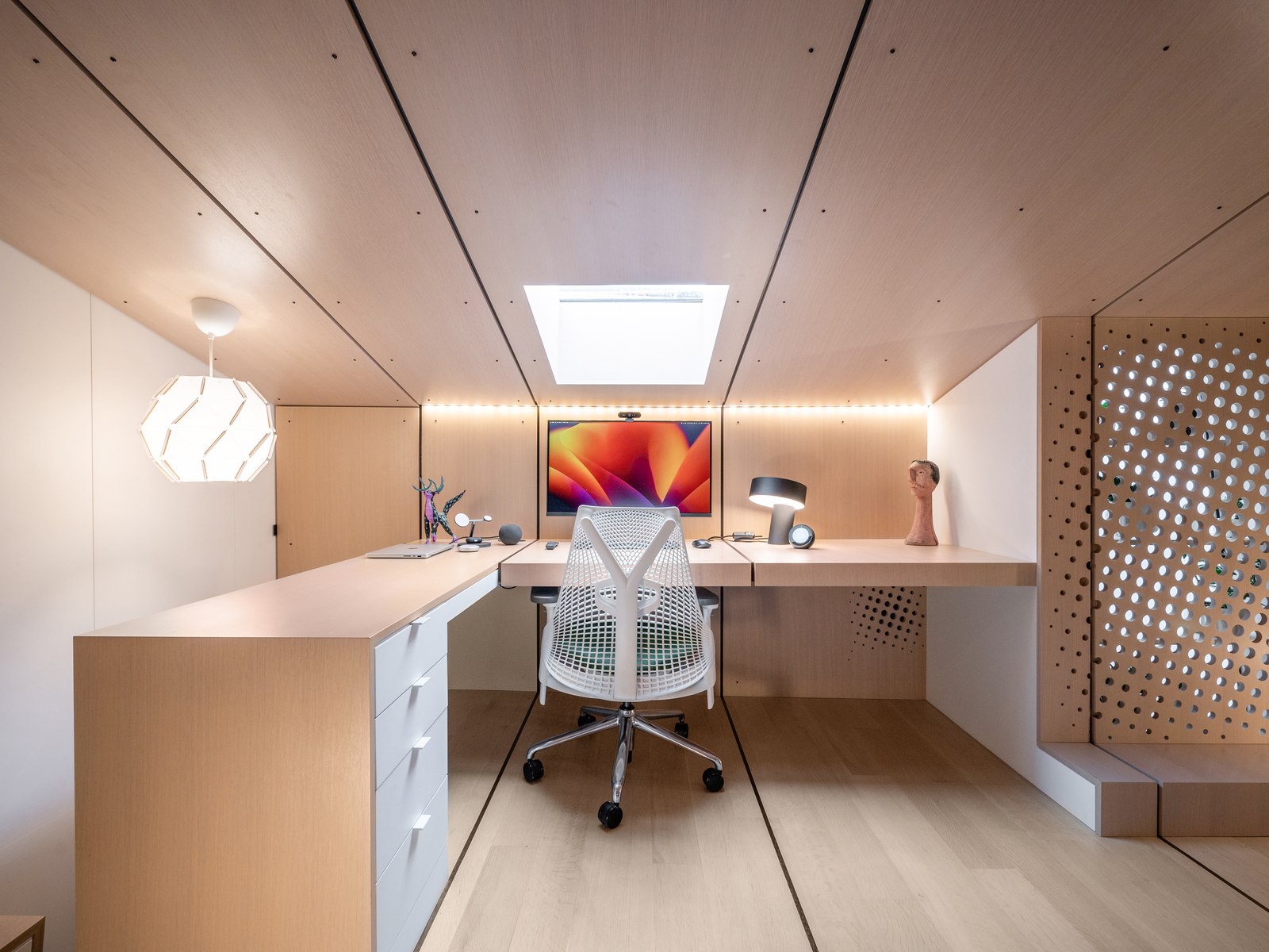 The same skylight, now over a desk