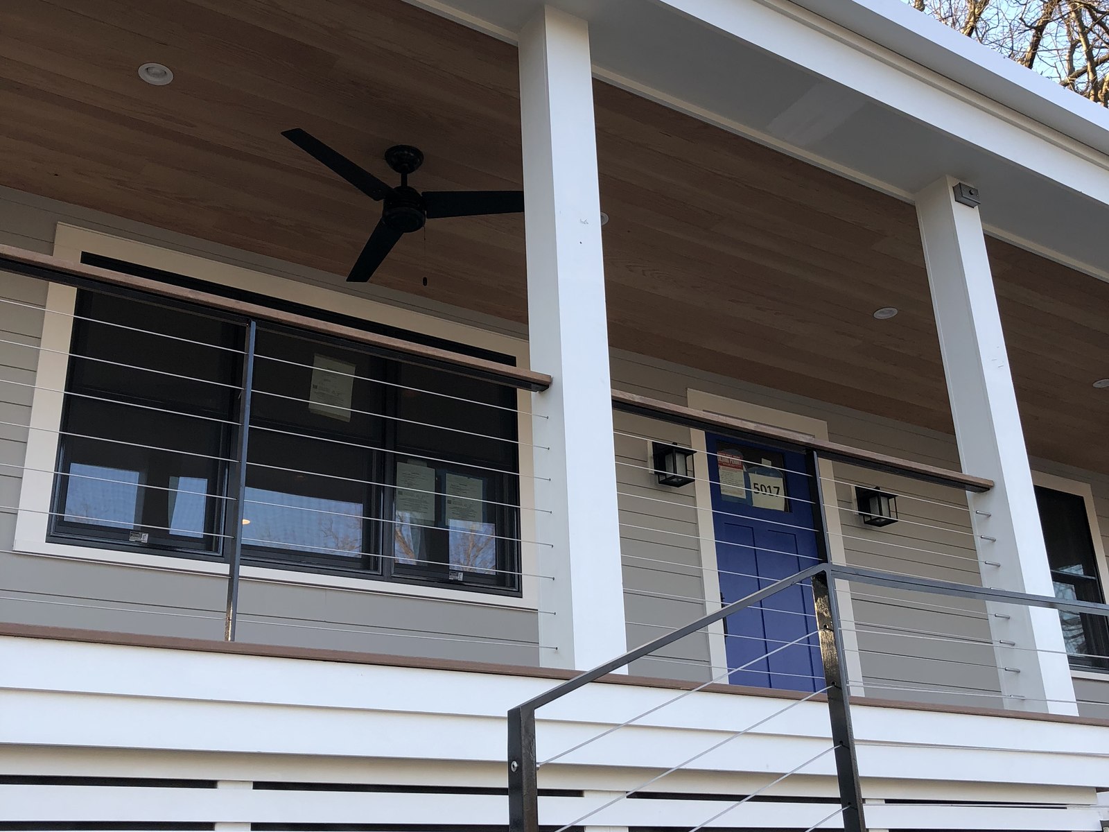 The same entry after, a full-width covered porch