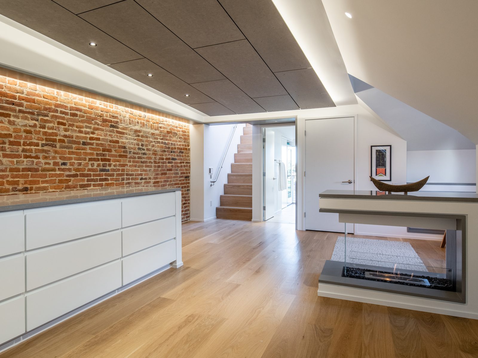 The finished room with the fireplace