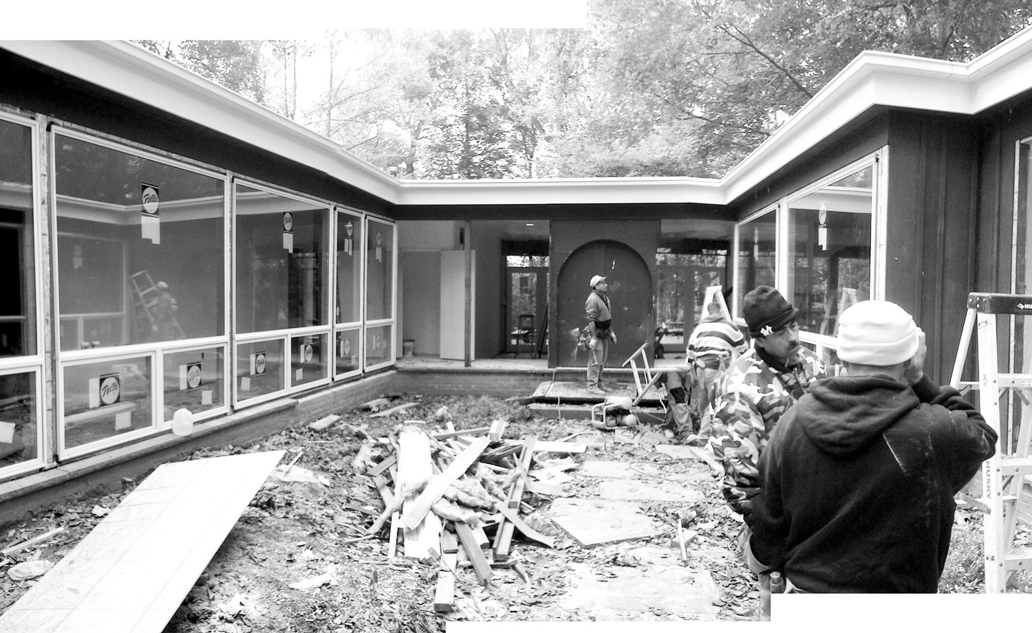The courtyard mid-construction, stripped back to earth