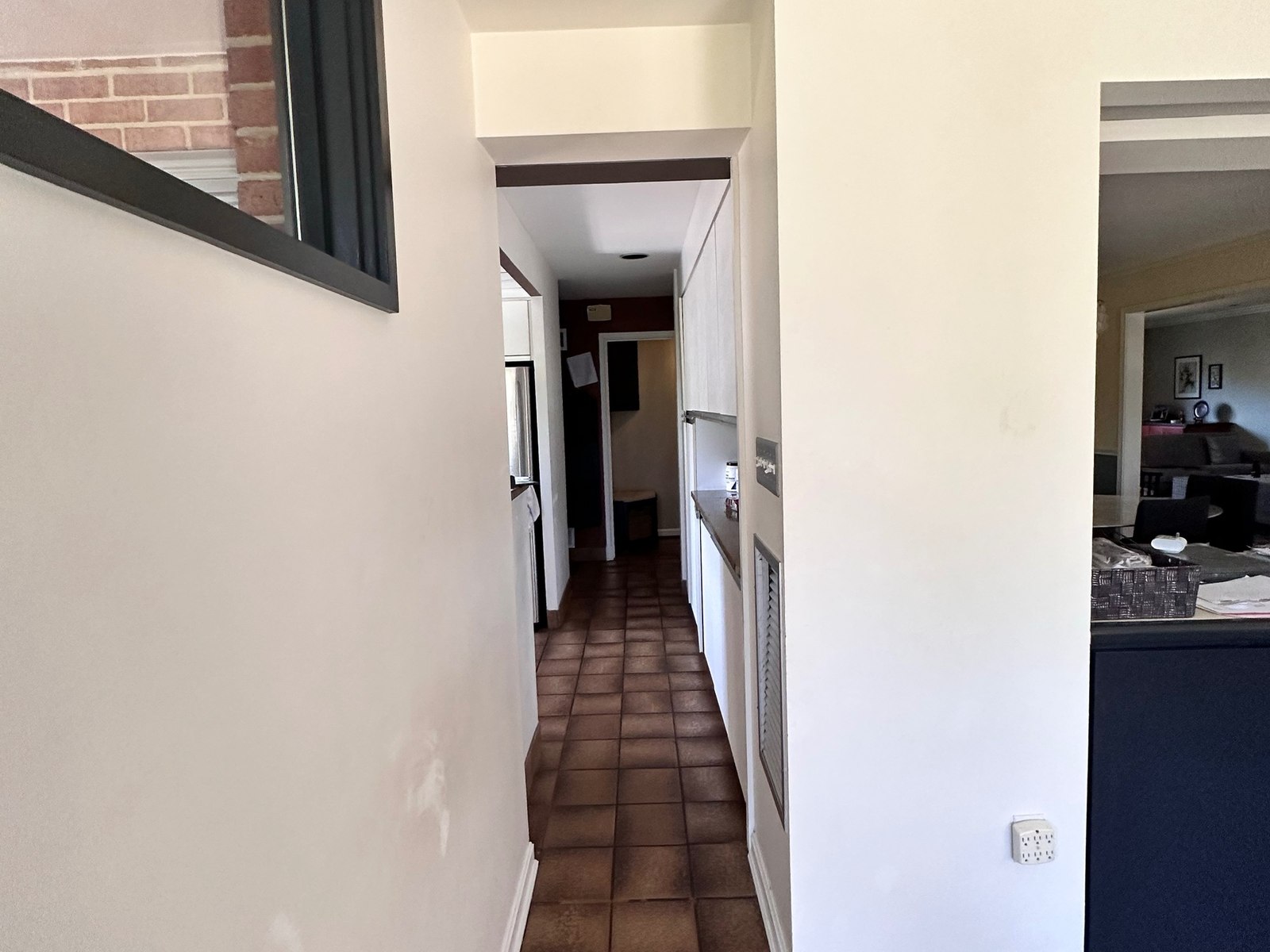 The original corridor, with the pantry strung along it and the kitchen beyond