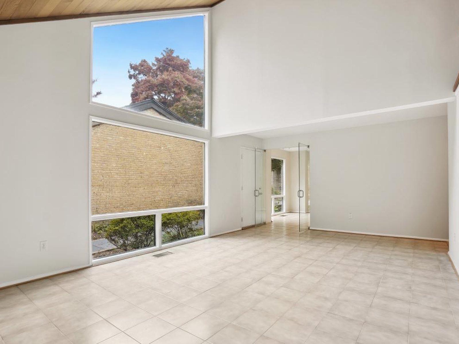 The double-height living room before