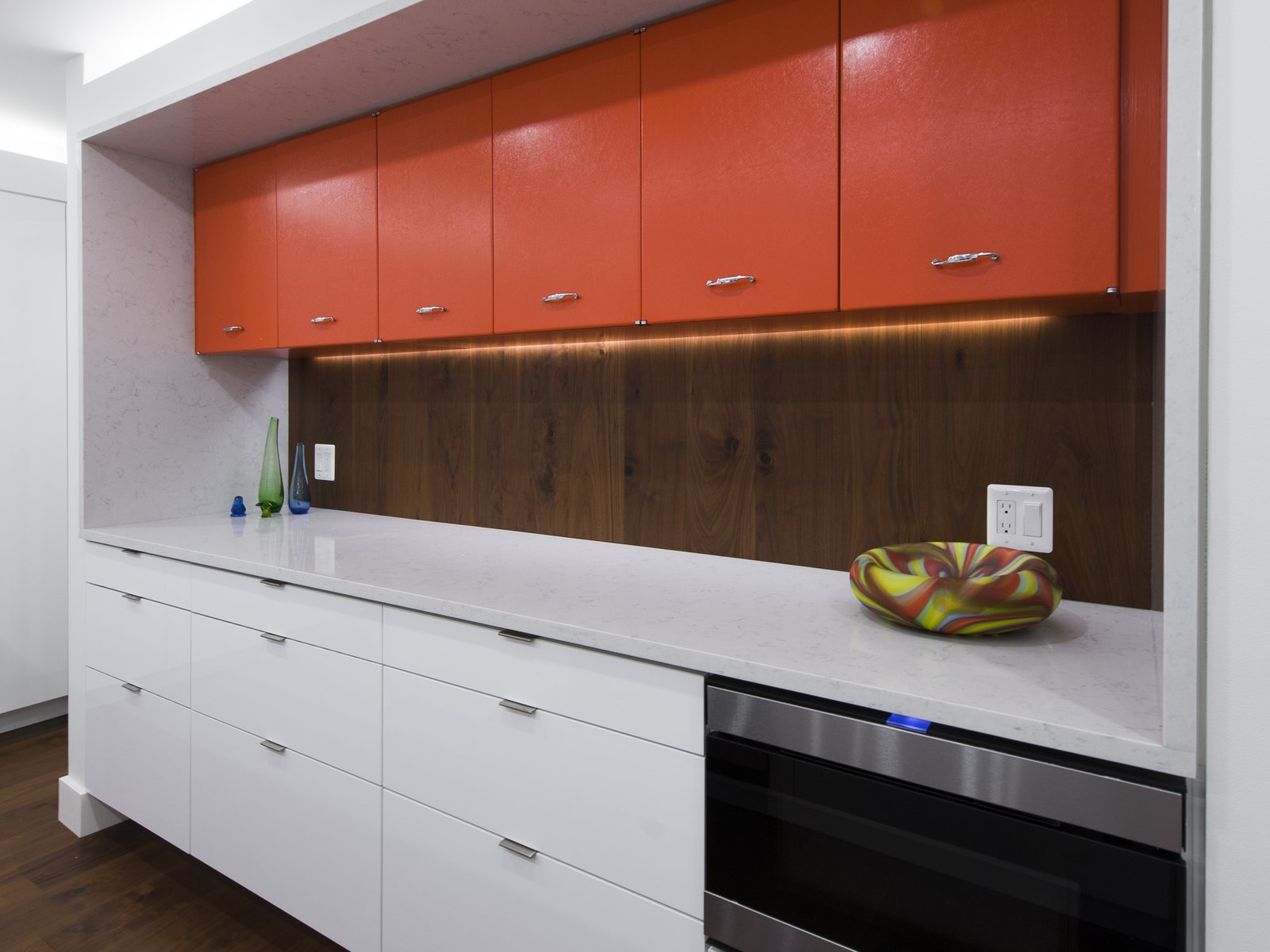 The salvaged cabinets after, floating over a walnut backsplash