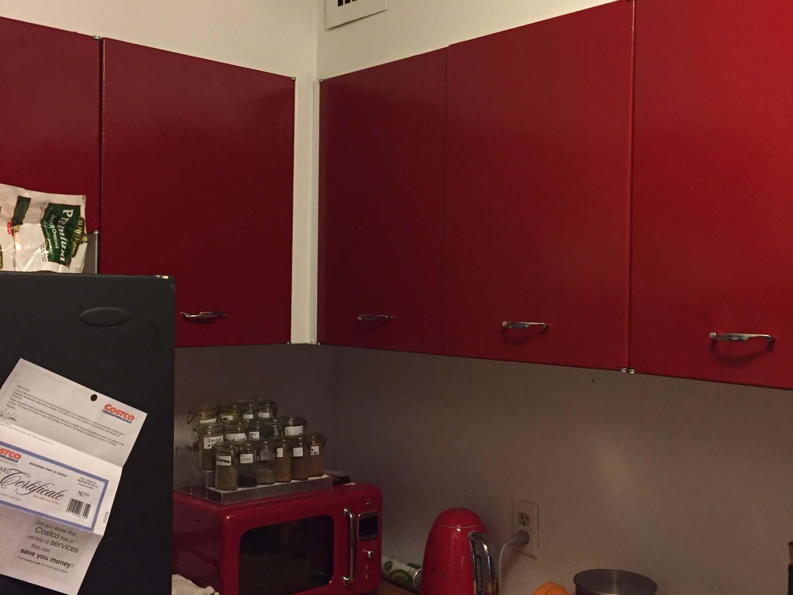The original red cabinets before, in the corner of the old kitchen
